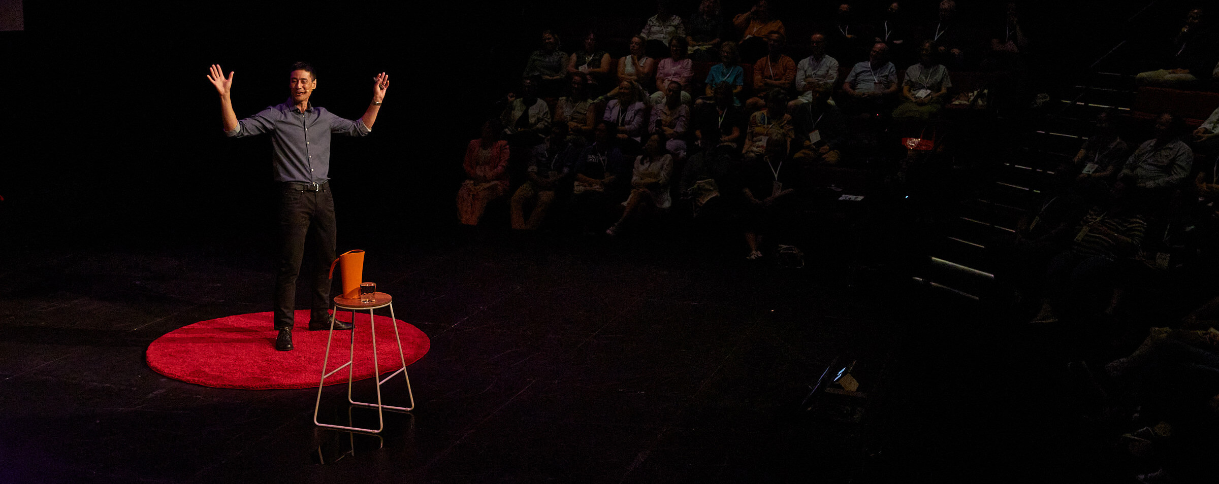 Daniel Sih on stage at TEDx Hobart 2023